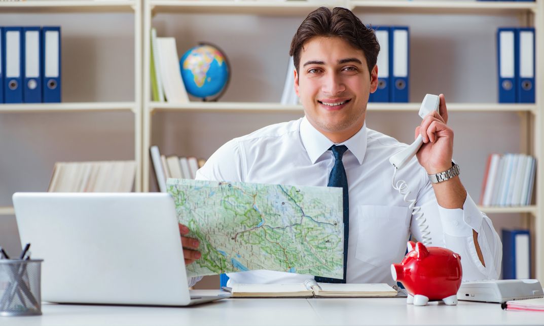 how does a travel agency make money